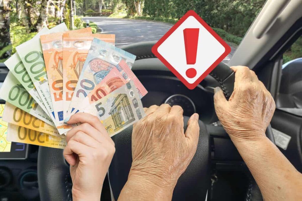 mani al volante di una persona anziana, con banconote euro e cartello attenzione