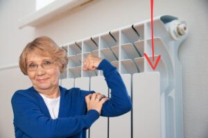 Termosifone con una freccia rossa che lo indica e una nonna